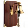 Brass bell on wooden plate Version with 10 cm Ø (700 g)